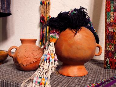 Two clay pots on a table