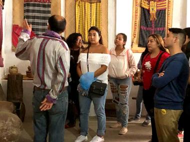 Tourists enjoy learning about the museum